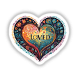 Colorful heart-shaped digital artwork with intricate floral patterns and the text "LOVED" in the center.