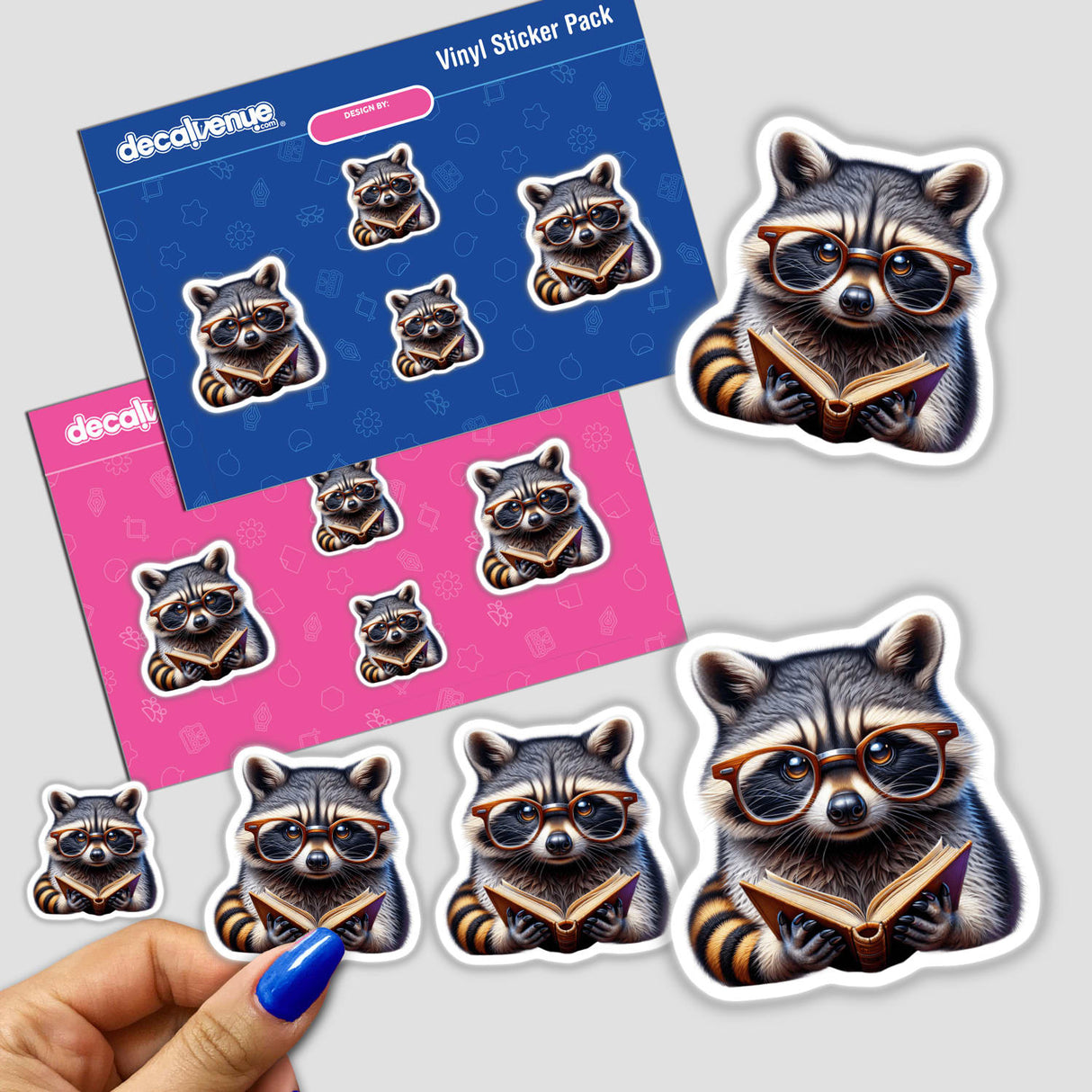 Raccoon With Reading Glasses Open Book stickers showing raccoons engrossed in books, some wearing glasses, ideal for unique vinyl sticker enthusiasts or digital art collectors from Decal Venue.