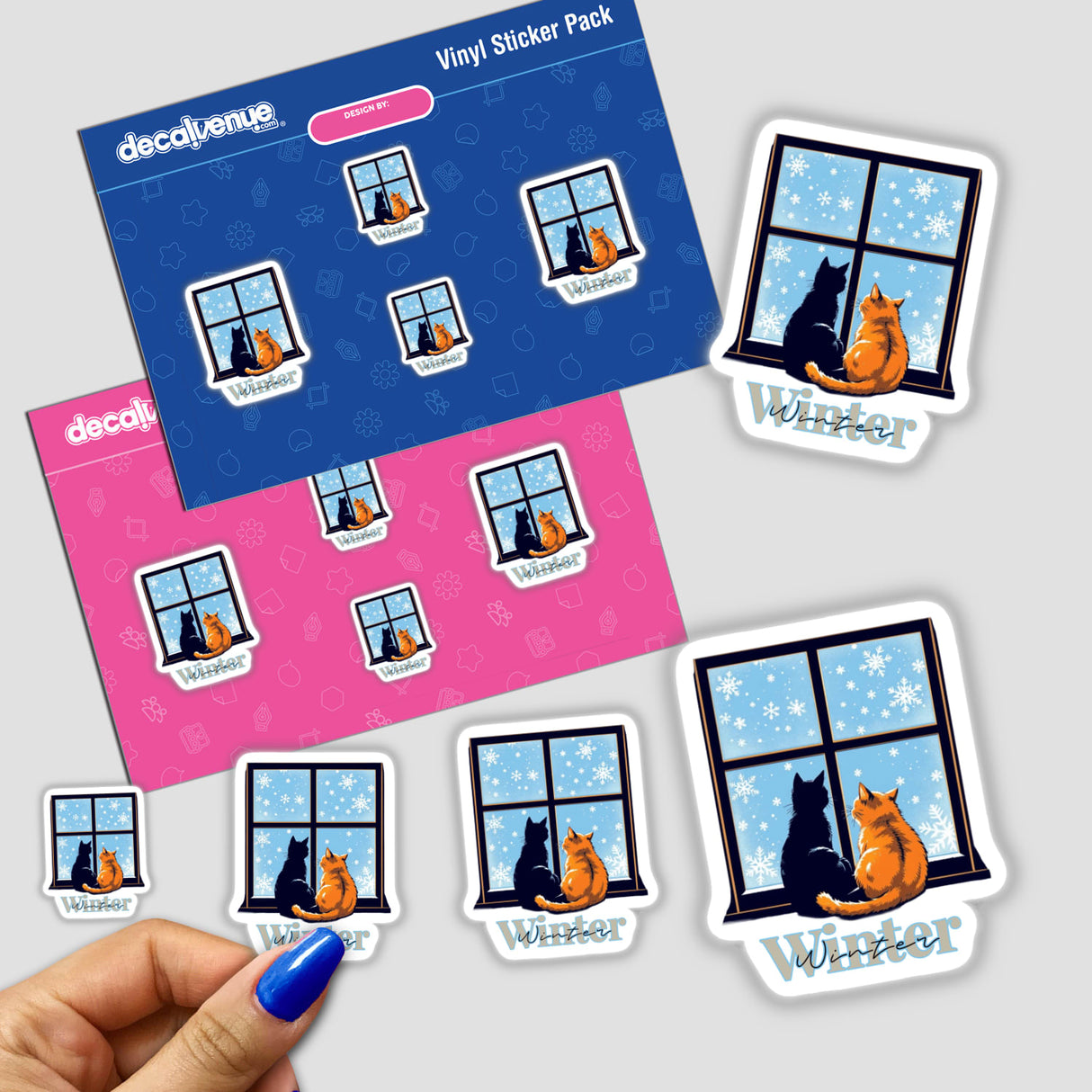 Stickers depicting Cute cats in Winter featuring various cats sitting and looking out of windows, available as vinyl stickers or digital artwork from Decal Venue.