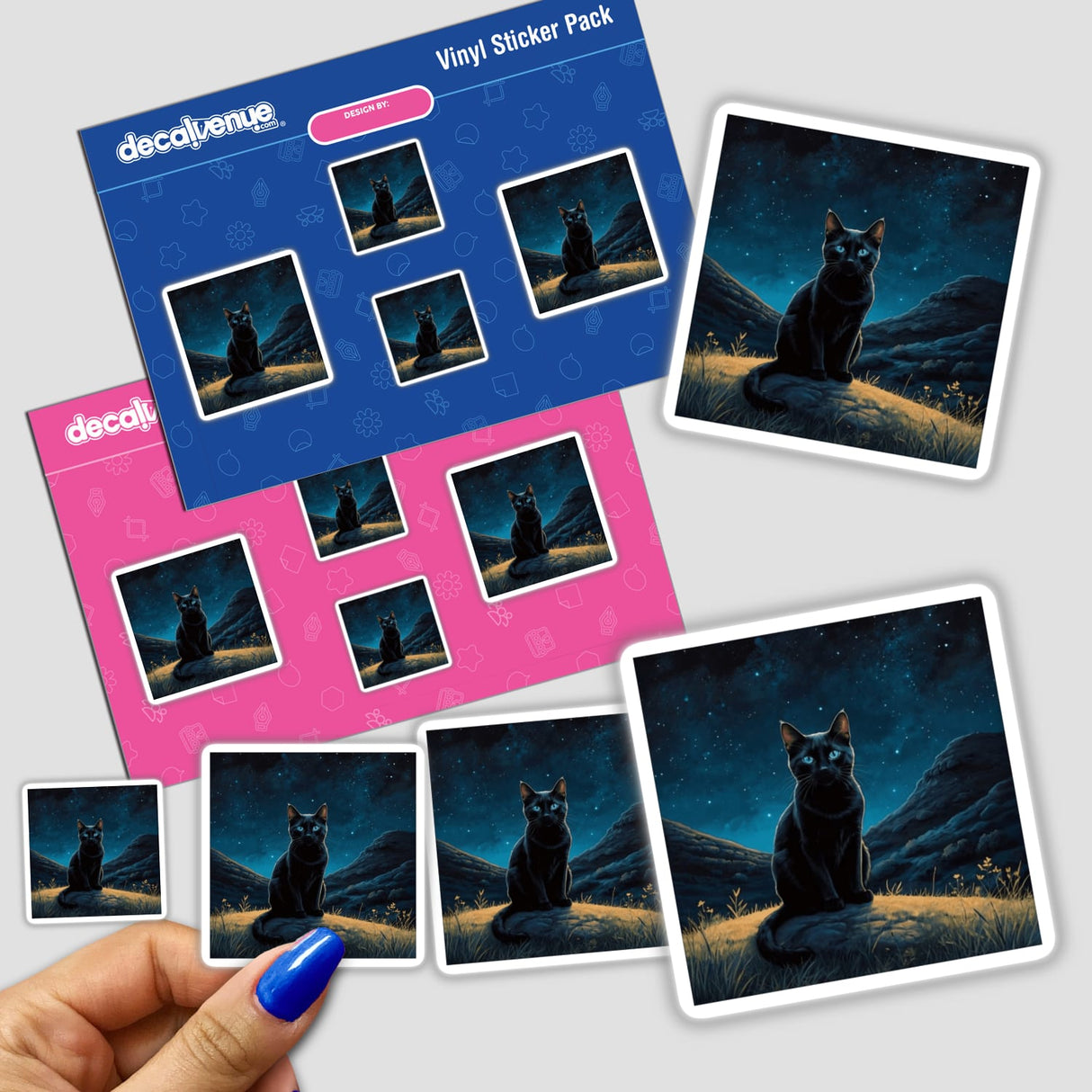 Sticker pack titled Black Cat On A Starry Night, featuring multiple stickers of a black cat sitting on a rock against a starry sky, held in a hand.