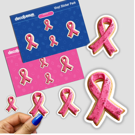 Pink Ribbon-Shaped Cookie with Glitter Accents for Breast Cancer Awareness featuring pink frosting and sprinkles, available as stickers or digital artwork.