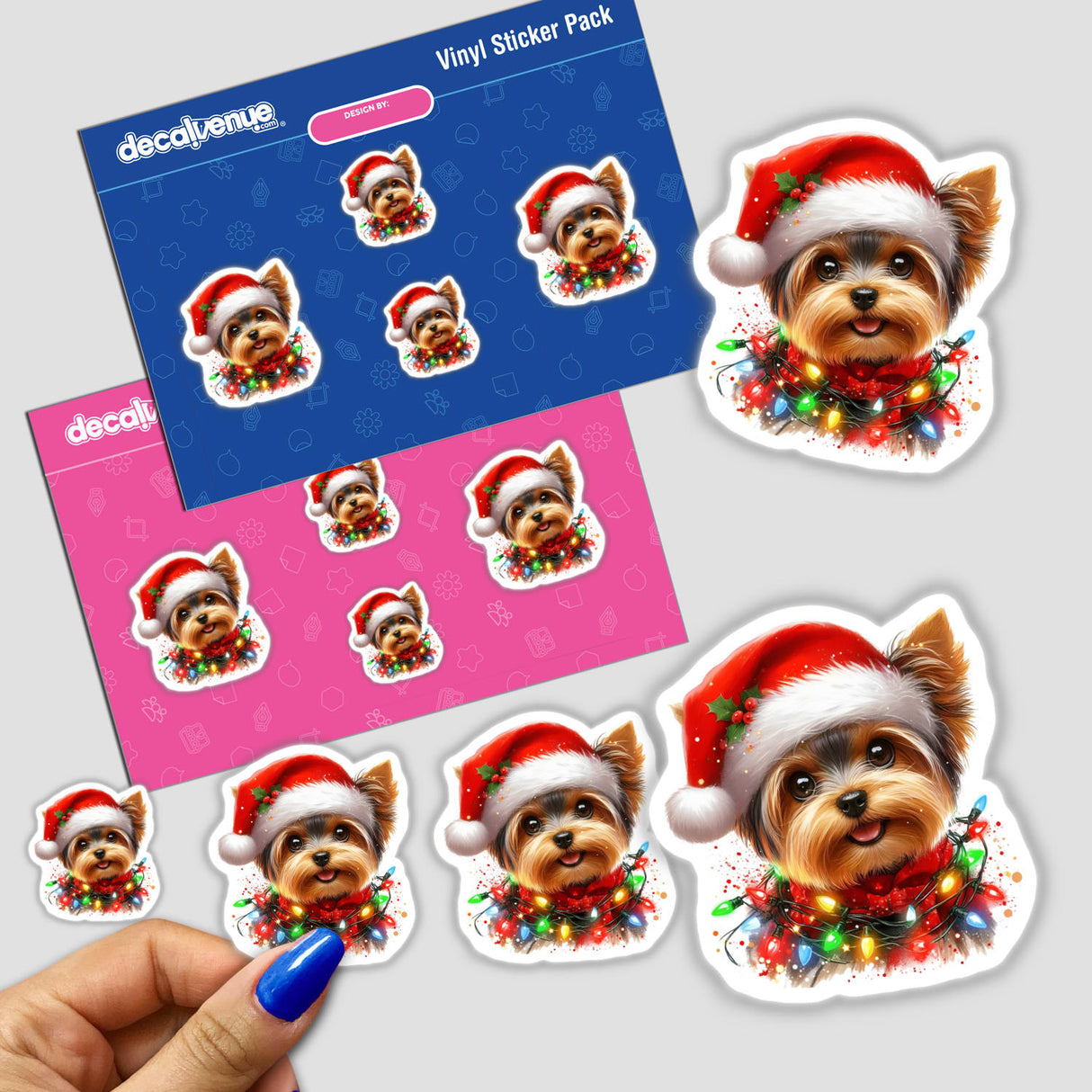 Yorkie Dog in Santa Hat Tangled Lights sticker, featuring a cartoon dog adorned with a Santa hat and wrapped in Christmas lights, available as stickers or digital artwork from Decal Venue.