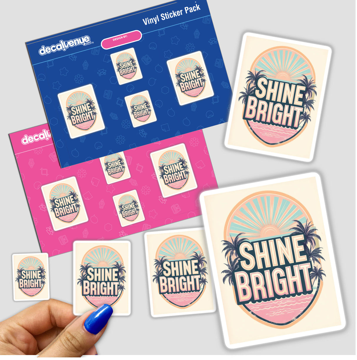 Hand holding Retro Beach Sunset ‘Shine Bright’ stickers, featuring palm trees and vibrant pastels, highlighting unique vinyl design from Decal Venue.