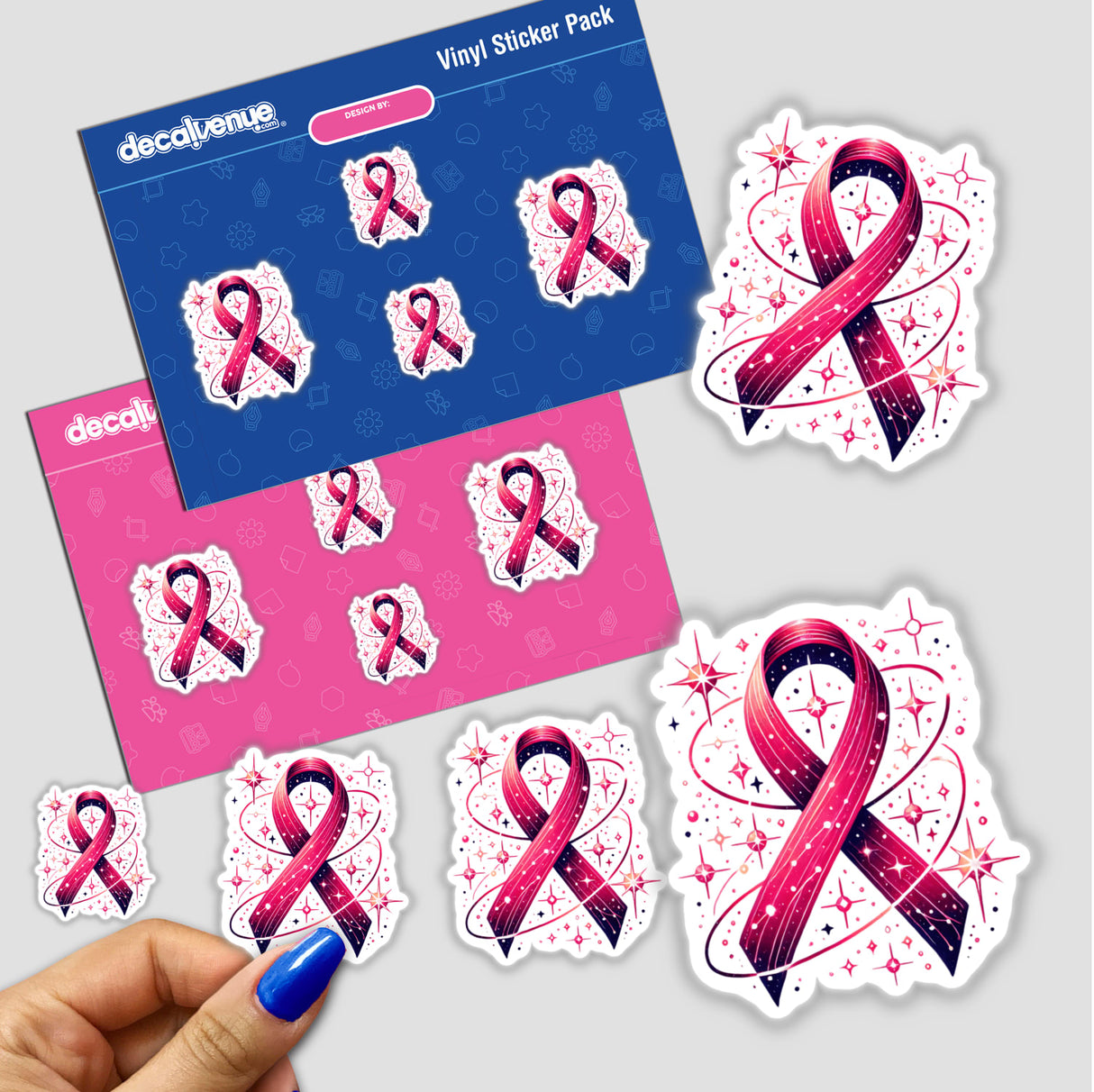 Hand holding a pack of Pink Ribbon and Stars Breast Cancer Awareness stickers featuring pink ribbons with stars and swirls.