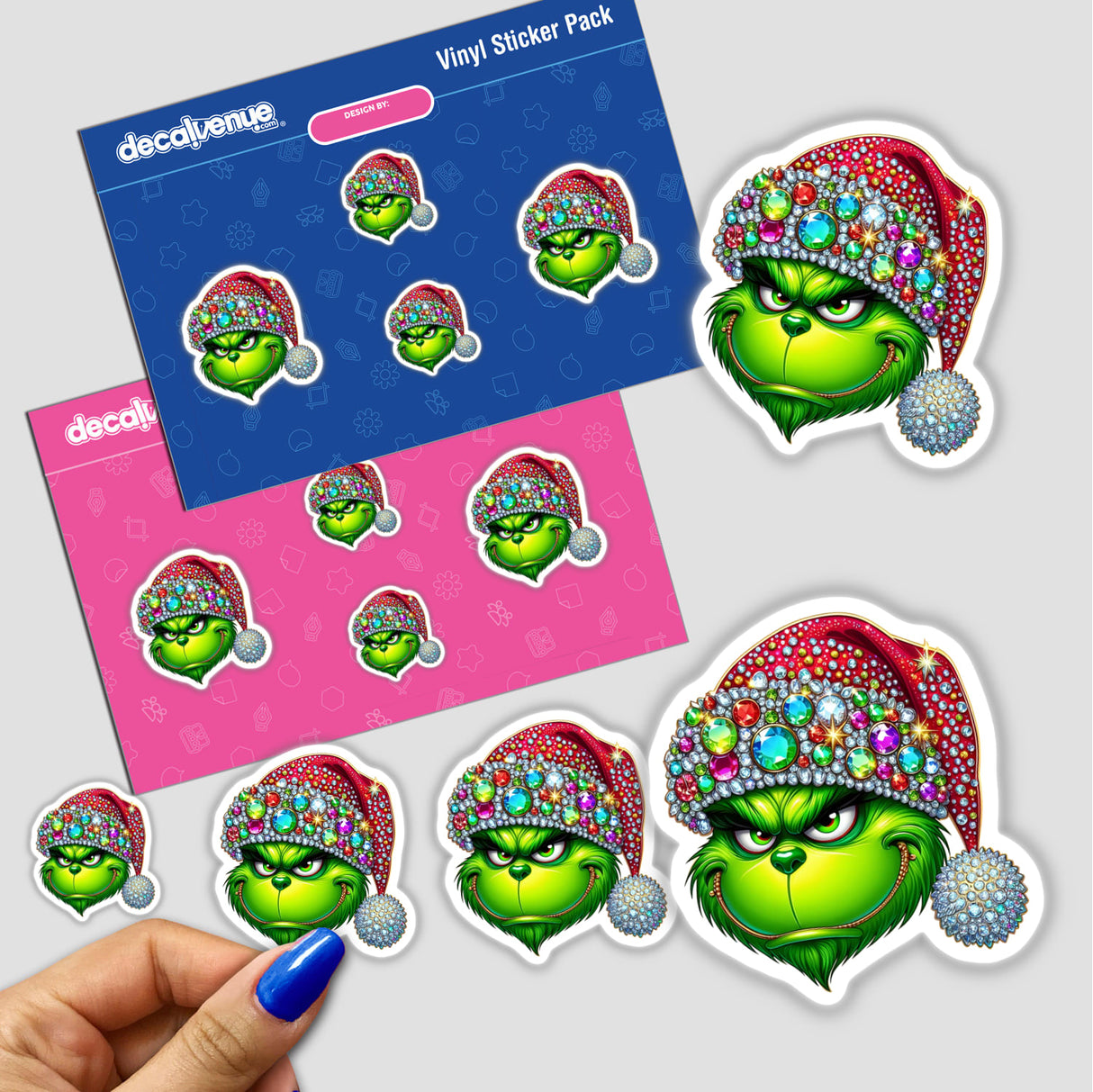 Green Grouch Christmas Face with Jeweled Santa Hat III sticker features a cartoon green face with a red hat adorned with colorful gems, available as stickers or digital artwork.