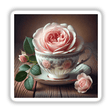 Delicate Tea Rose Blooming in a Vintage Teacup, depicted as a pink rose elegantly nestled in a classic porcelain teacup. Available as stickers or digital artwork from Decal Venue.