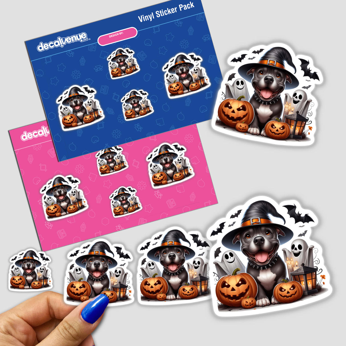 Colorful stickers featuring a cheerful Pitbull dog dressed as a witch surrounded by friendly ghosts and jack-o-lanterns, displayed on a Vinyl Sticker Pack from the Decal Venue store.