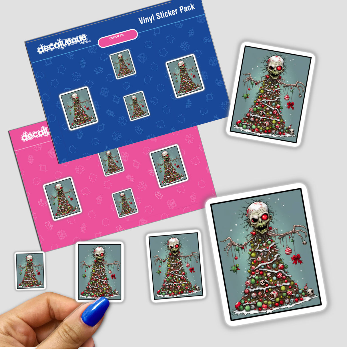 Zombie Christmas Tree stickers displayed with a hand holding the sticker pack, featuring multiple cartoon Christmas tree designs. Available as stickers or digital artwork from Decal Venue.