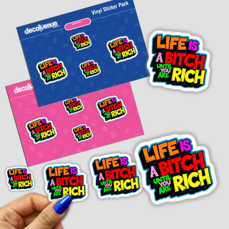 Hand holding a Life Is A Bitch Until You Are Rich sticker, featuring colorful text and graphic design, representing Decal Venue's unique sticker and digital art collection.