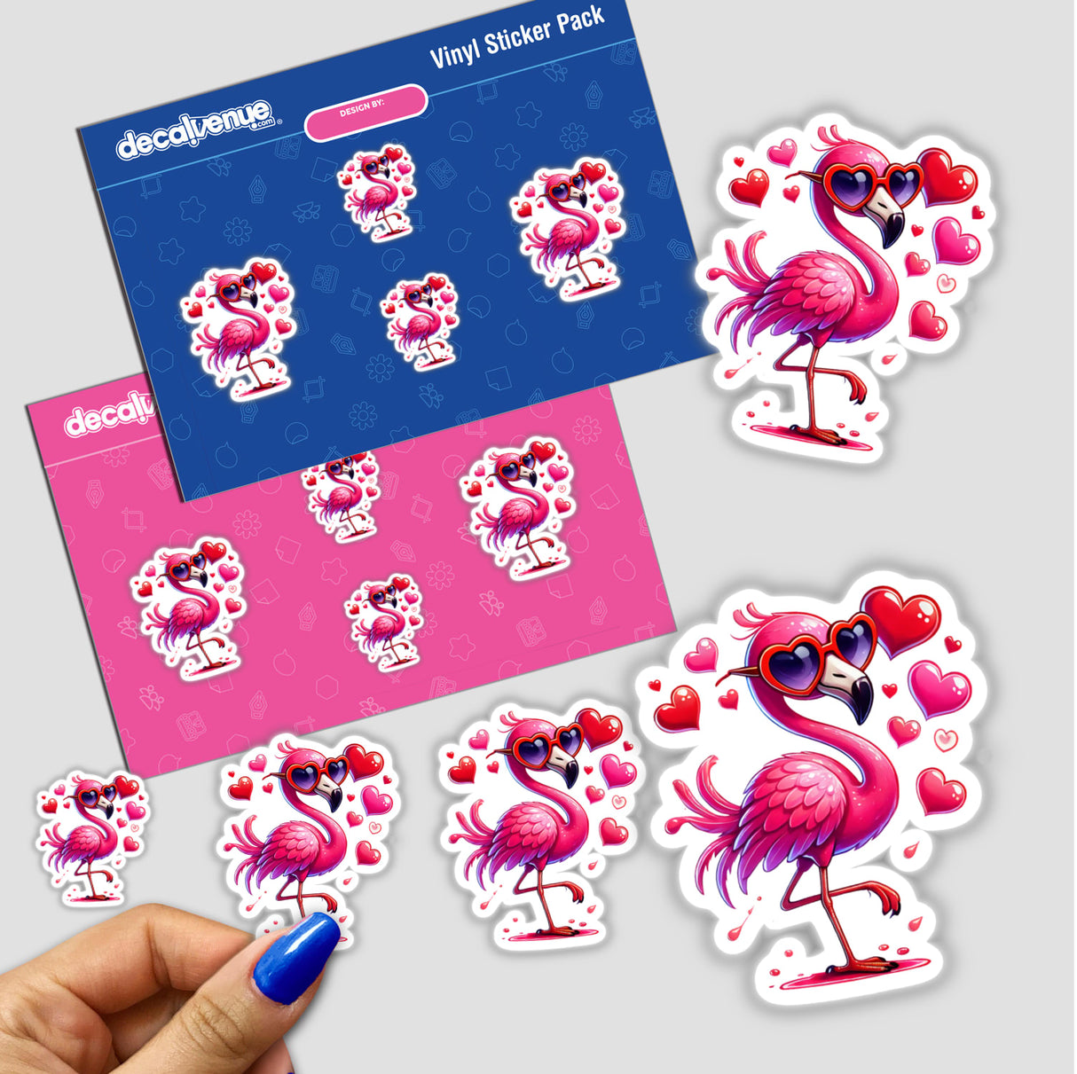 Dripping with Love Flamingo sticker pack, featuring a hand holding stickers of flamingos adorned with hearts and sunglasses. Available as physical stickers or digital artwork from Decal Venue.