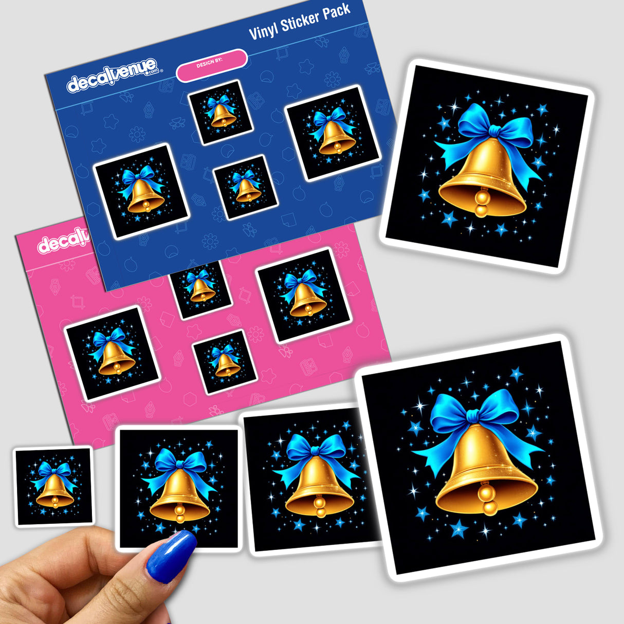 Gold Bell with Blue Ribbon and Sparkling Stars sticker pack, featuring a hand holding the stickers. Perfect for adding a festive touch to any surface, available as stickers or digital artwork.