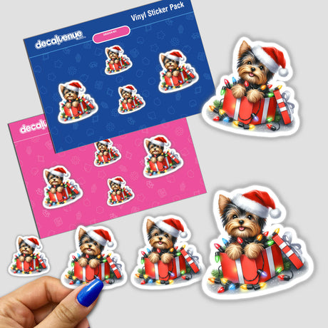 Christmas Lights Santa Yorkie Dog in Gift Box sticker featuring a cartoon dog wearing a Santa hat, surrounded by festive lights, available as a sticker or digital artwork.