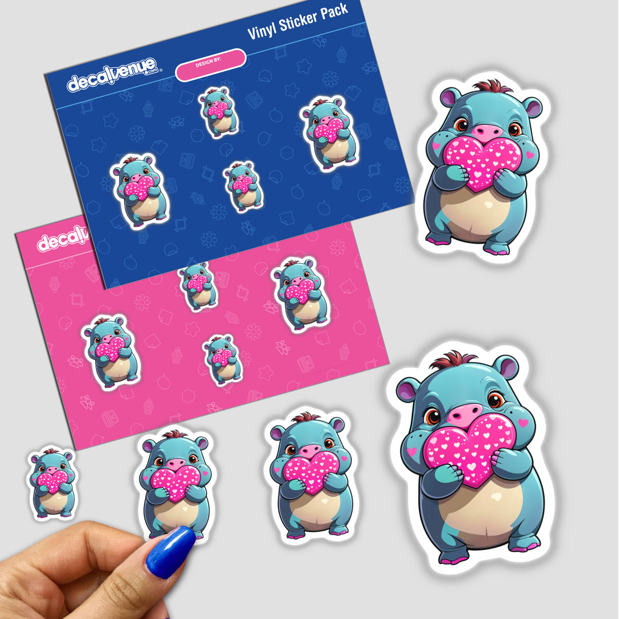 Sticker pack titled A Cute Pygmy Hippo With Love Hearts, featuring cartoon hippos holding hearts. Available as stickers or digital artwork, reflecting Decal Venue's unique sticker and digital art collection.