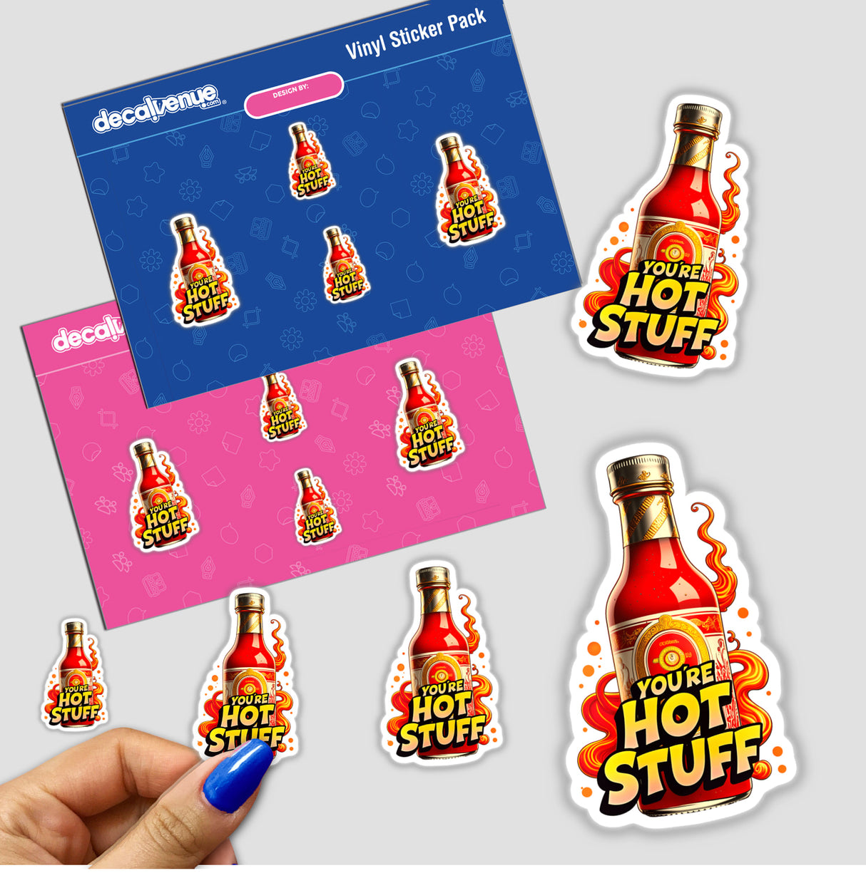 Hand holding 'You're Hot Stuff' sticker pack featuring vibrant hot sauce bottle designs, available as stickers or digital artwork from Decal Venue.