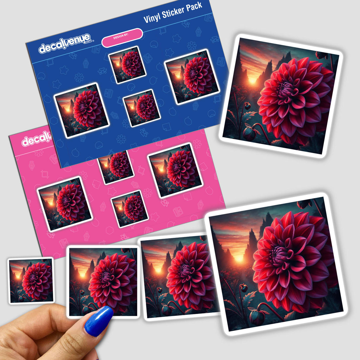 Hand holding a sticker pack featuring the design Crimson Dahlia - Garden Jewel in Twilight, showcasing detailed floral artwork.