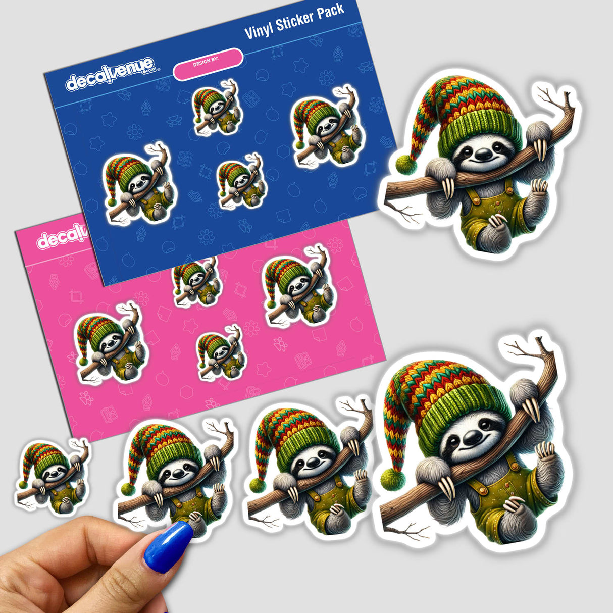 Colorful sloth gnome stickers featuring a cartoon sloth character in various poses, wearing a knit hat and holding branches, displayed on a Decal Venue branded vinyl sticker pack background.