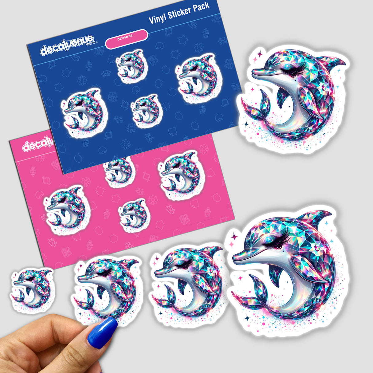 Colorful and vibrant vinyl stickers featuring a sparkly, faceted dolphin design. The stickers are displayed on a packaging background with the Decal Venue brand name, showcasing the product's artistic and whimsical style.