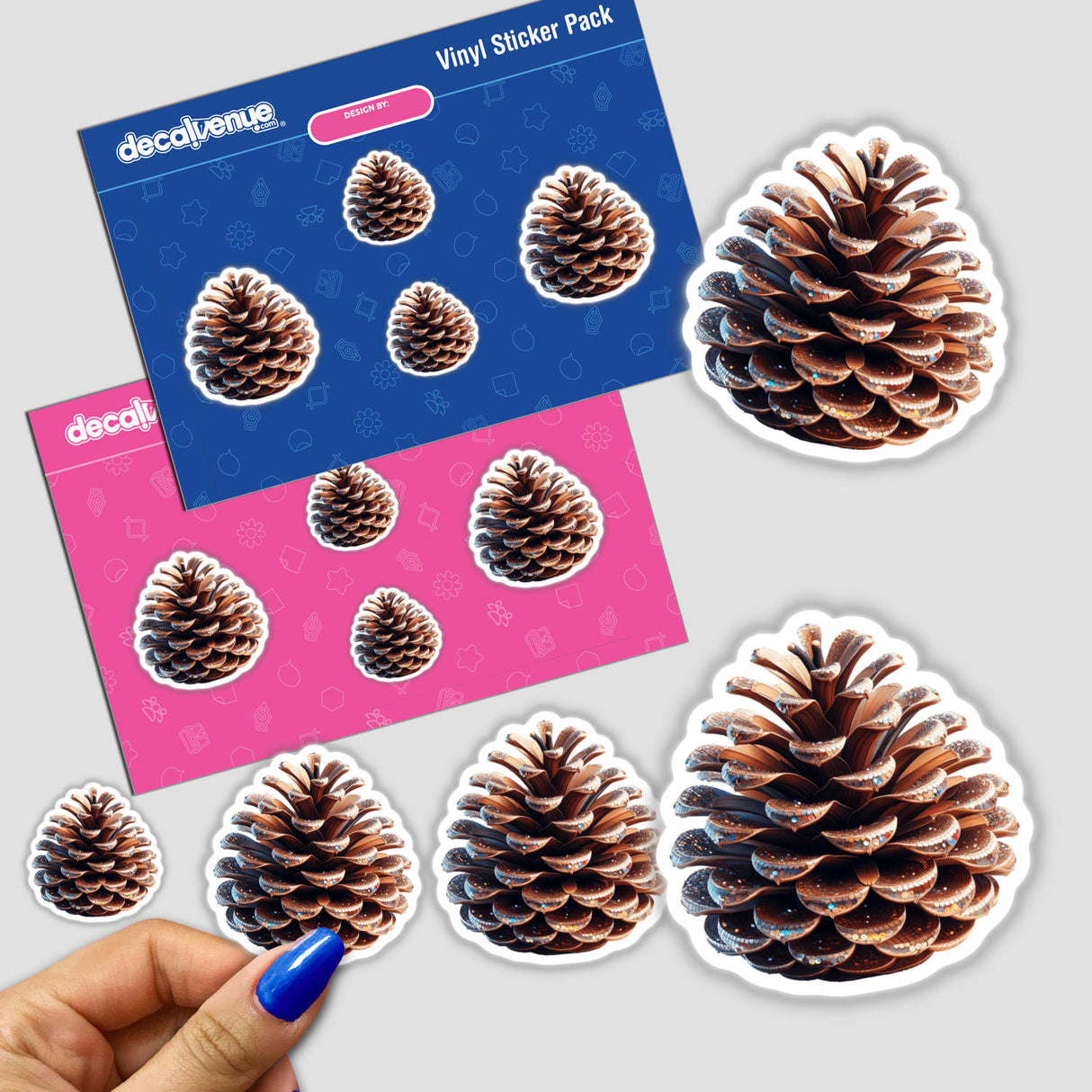 Hand holding a sticker pack titled Festive Decorative Pine Cone, featuring detailed pine cone stickers, available as stickers or digital artwork.