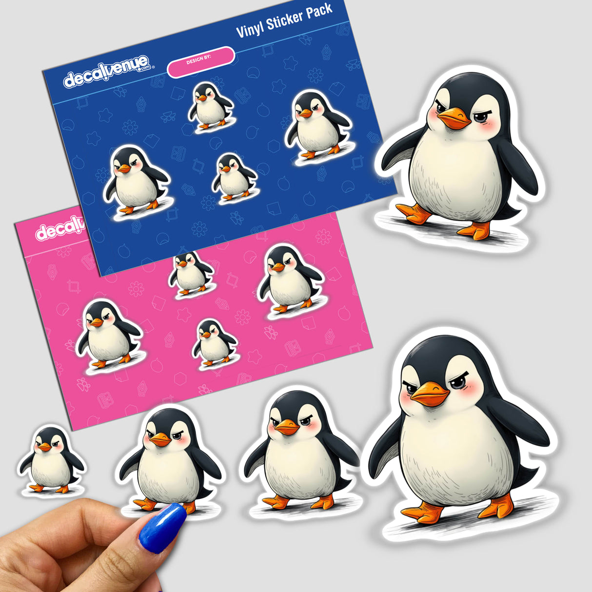 Cute Cartoon Penguin with Orange Feet sticker held by a hand, featuring a close-up of the penguin character available as stickers or digital artwork.