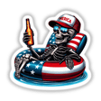 Skeleton American Flag Float Merica: A skeleton relaxing on a pool float, holding a beer bottle, with an American flag in the background. Available as stickers or digital artwork.