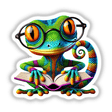 Gecko With Reading Glasses Open Book: A whimsical illustration of a cartoon gecko wearing glasses and engrossed in a book, available as stickers or digital artwork from Decal Venue.