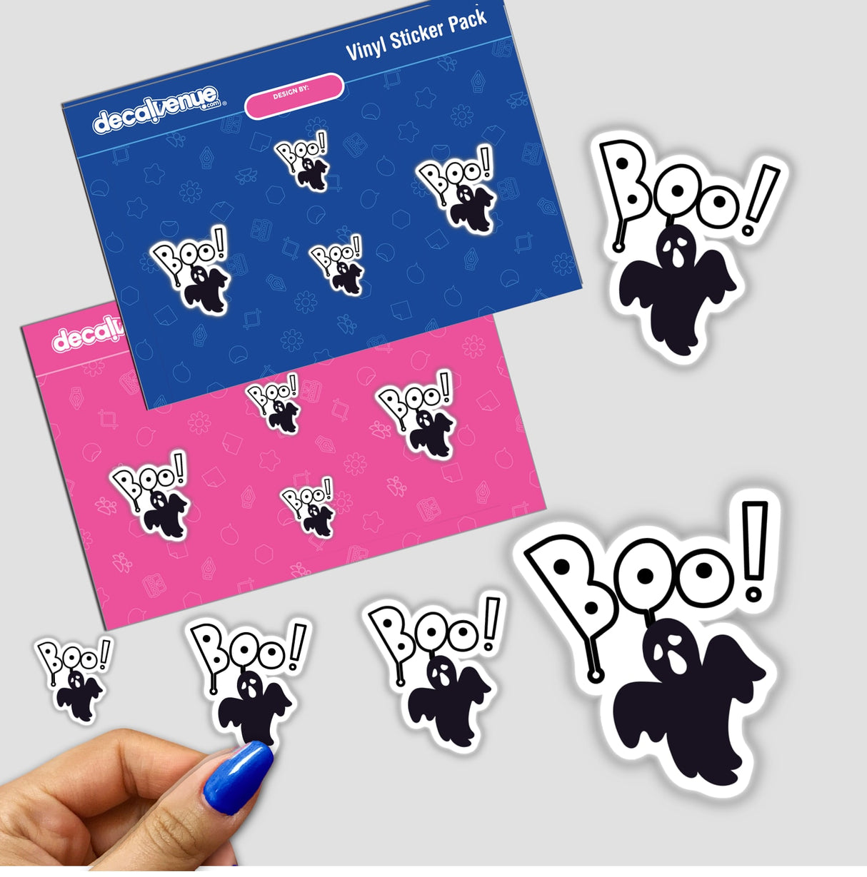 Boo all black Ghost sticker featuring playful ghost designs and text, available as unique stickers or digital artwork. A hand with blue nail polish showcases its size and detail.