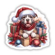 Christmas Eve Pitbull Dog wearing a Santa hat and scarf, surrounded by presents, available as stickers or digital artwork from Decal Venue.