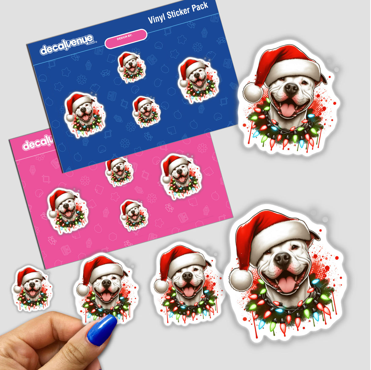 White Pitbull Santa in Christmas Lights sticker featuring a cartoon dog in a Santa hat adorned with festive lights, available as stickers or digital artwork from Decal Venue.