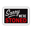 Sticker featuring 'Sorry We're Stoned' in bold red letters on a black background, available as a unique vinyl sticker or digital artwork from Decal Venue.