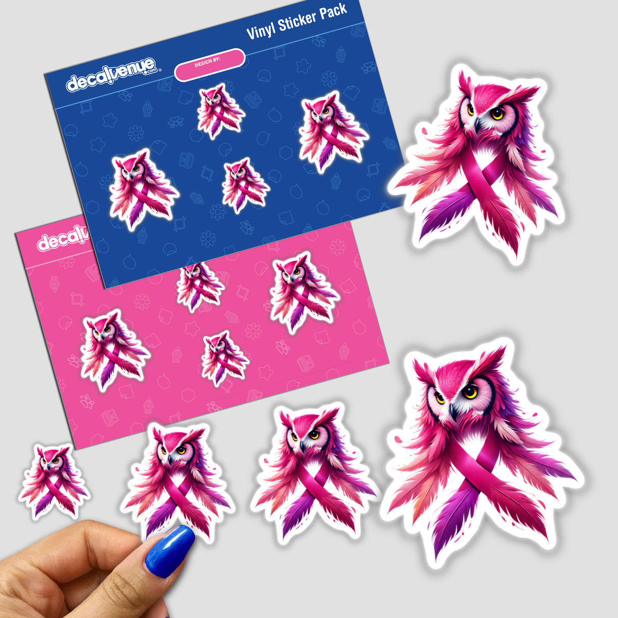 Sticker featuring a pink owl with feathers and a pink ribbon, symbolizing breast cancer awareness. The owl is held in a close-up of a person's hand. Available as stickers or digital artwork.