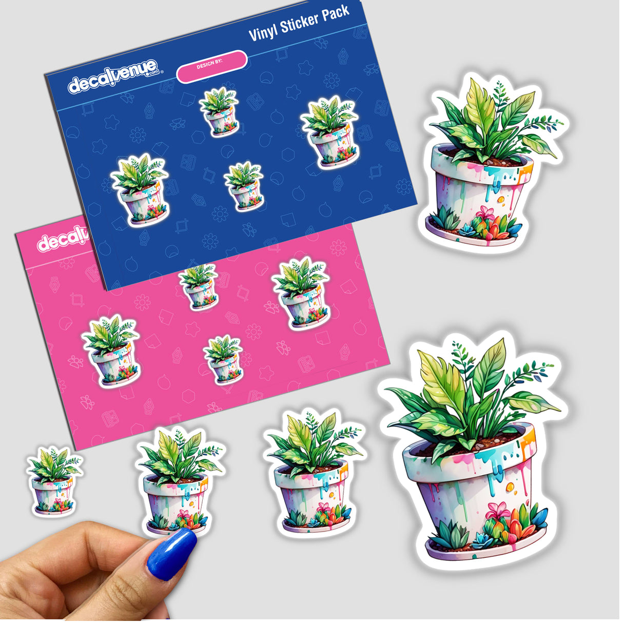 Botanical Sticker | Tropical Potted Plant for a Lush Aesthetic; hand holding a detailed sticker of a vibrant potted plant, perfect for adding a lively, tropical touch to any space.