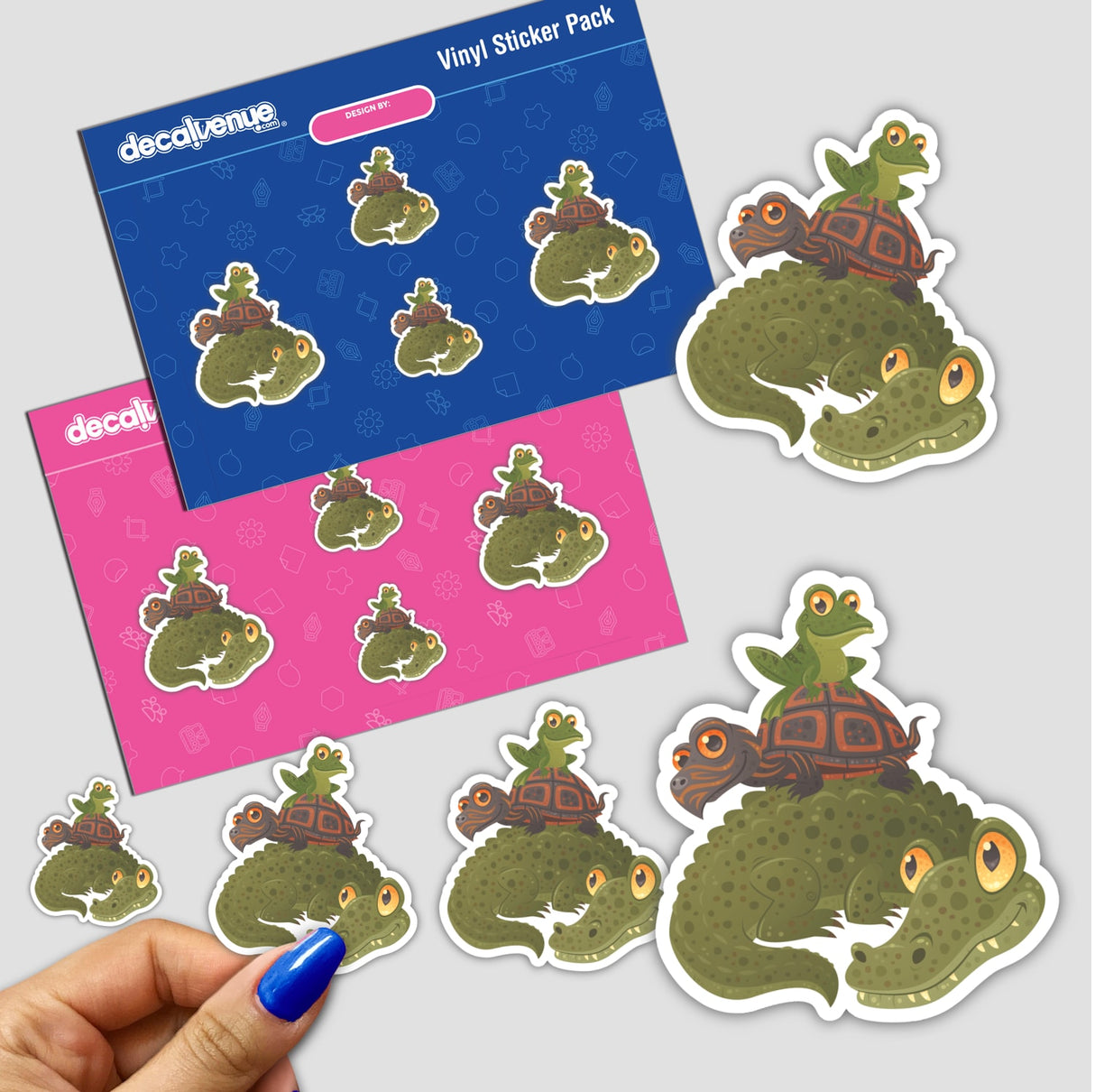 Swamp Squad sticker pack featuring cartoon animals, including a turtle and frog on reptiles, held by a hand. Available as a pack or individual stickers.