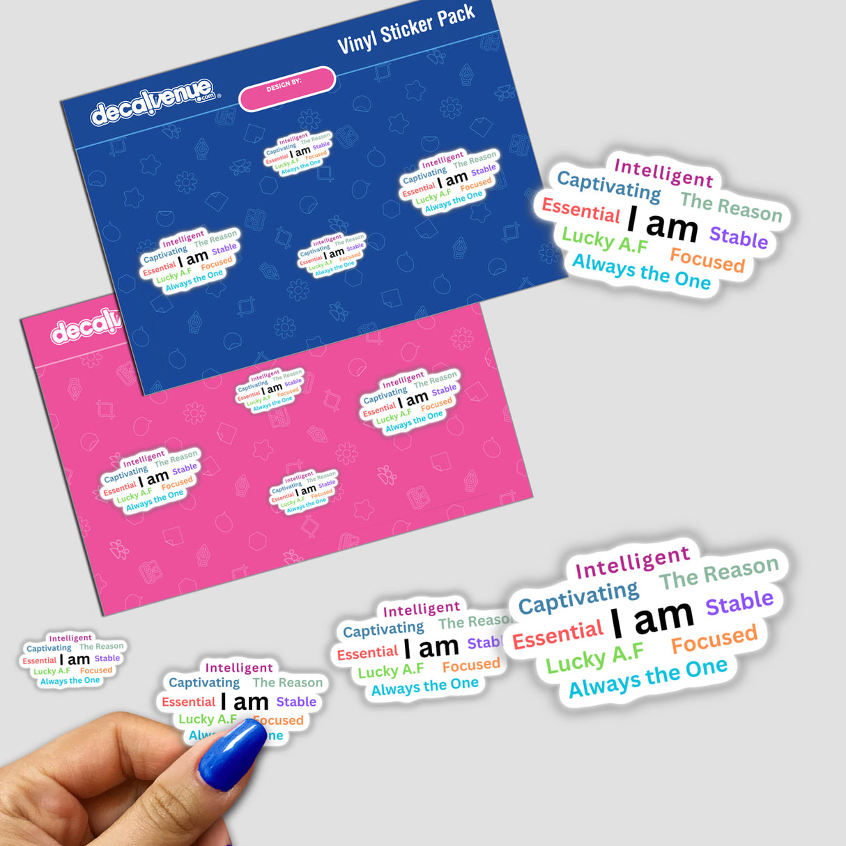 Hand holding Reprogramming Affirmations stickers, featuring text designs, showcasing unique vinyl stickers from Decal Venue.