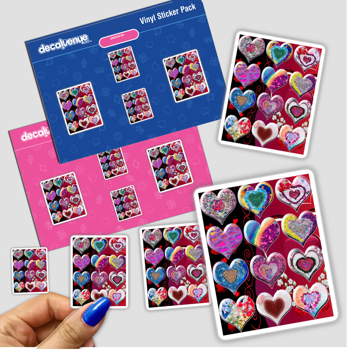 A hand holds a pack of heart-themed stickers, showcasing various heart shapes, perfect for personalizing items. Available as stickers or digital artwork from Decal Venue.