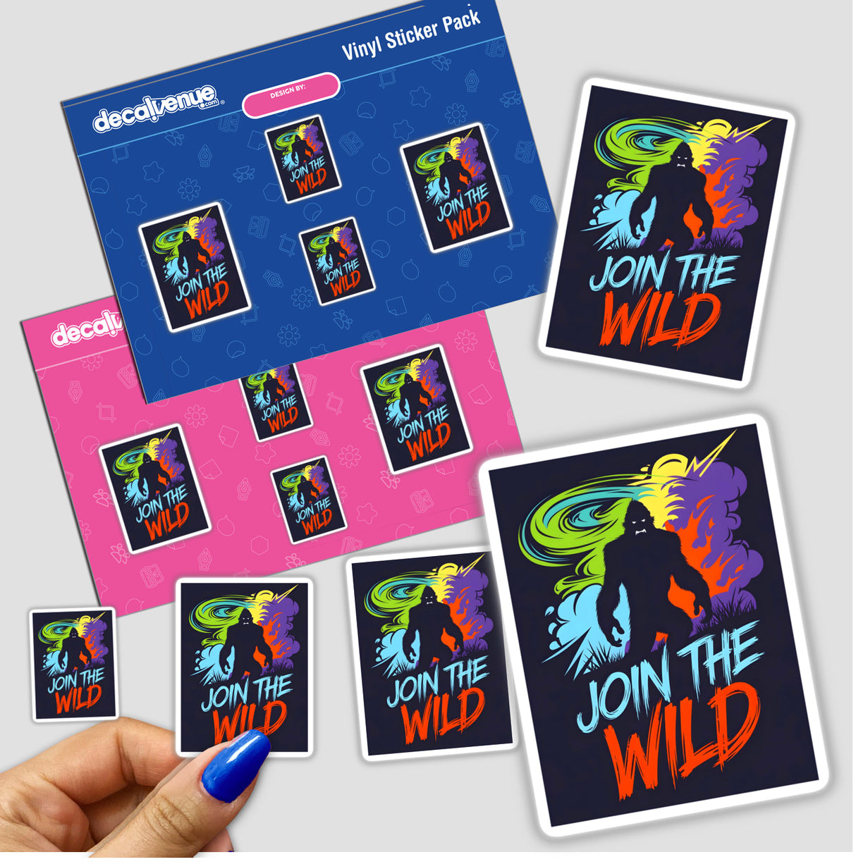 Join The Wild With Bigfoot sticker pack held in a hand with blue nail polish, featuring colorful designs of Bigfoot silhouettes, available as stickers or digital artwork.