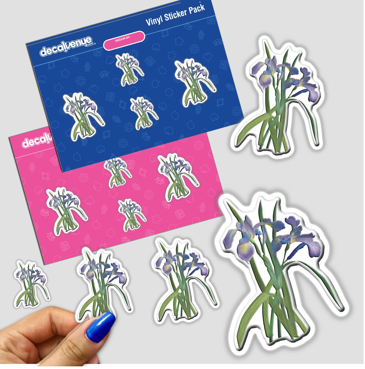 Hand holding American Wild Flowers sticker pack, showcasing intricate floral designs, available as stickers or digital artwork from Decal Venue.