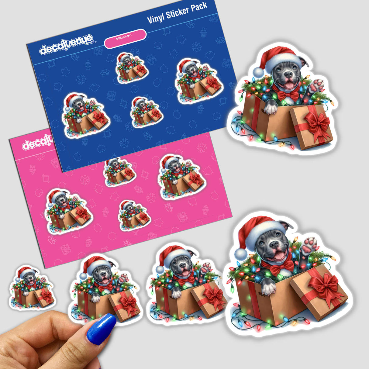 Santa Pitbull Dog in a Christmas Box V sticker pack featuring a playful pitbull in a festive box adorned with lights, available as stickers or digital artwork from Decal Venue.