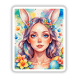 A Cute Easter Bunny Girl artwork featuring a cartoon-like girl with bunny ears and flowers, available as stickers or digital art, perfect for Easter celebrations.