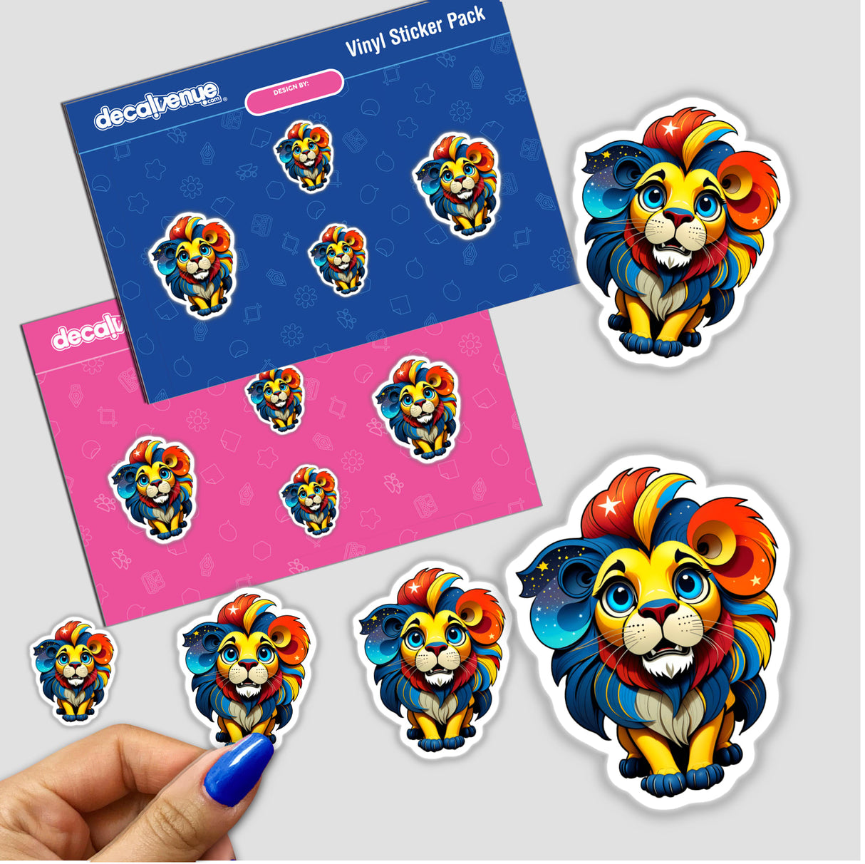 A Cute Little Lion sticker, featuring a cartoon lion with a colorful mane, held by a hand. Available as stickers or digital artwork from Decal Venue.