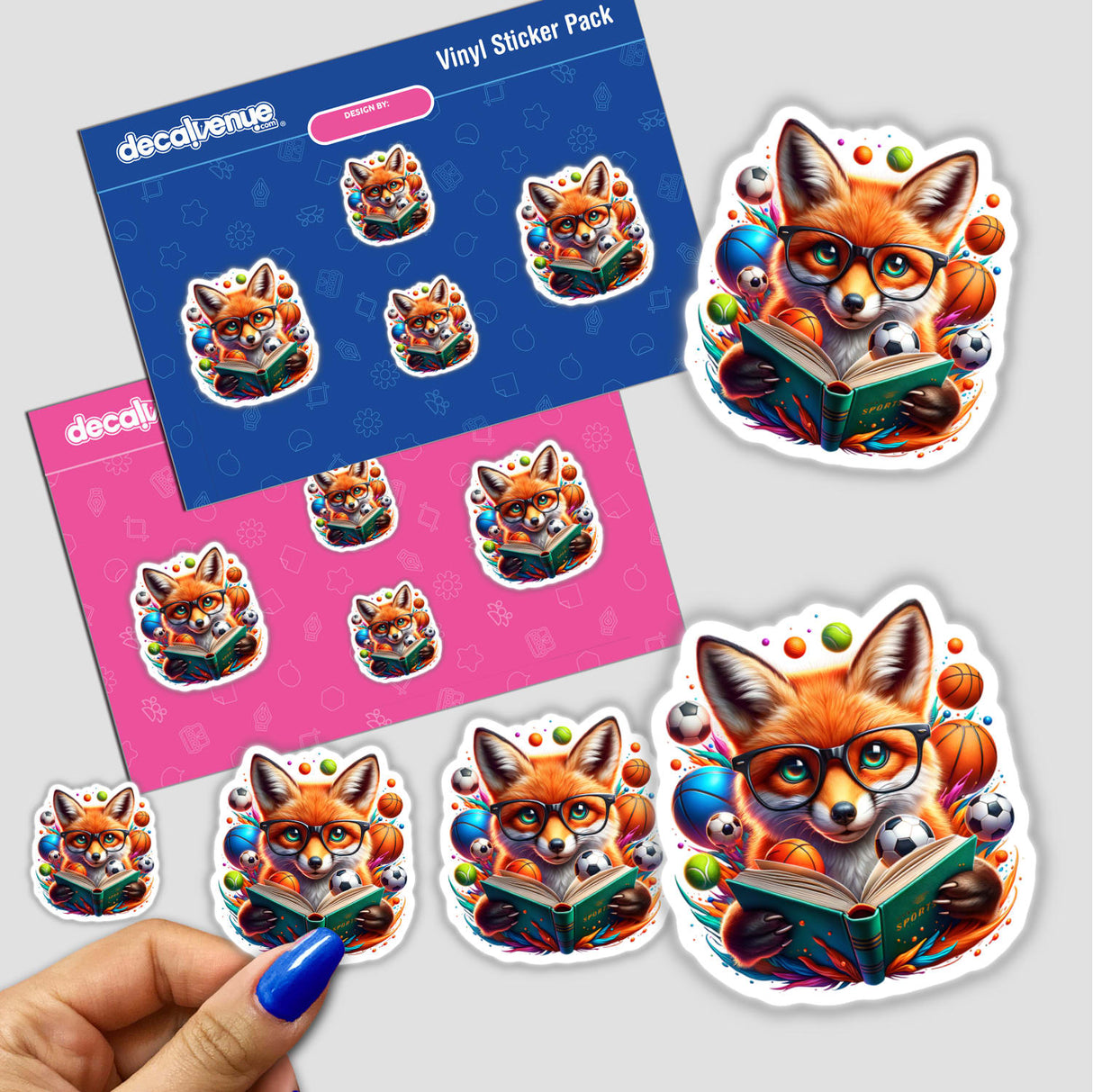 Sticker featuring a cartoon fox with glasses reading a book, embodying the playful Fox Reading a Book with Glasses and Sports Balls theme. A hand with blue nail polish holds one sticker.