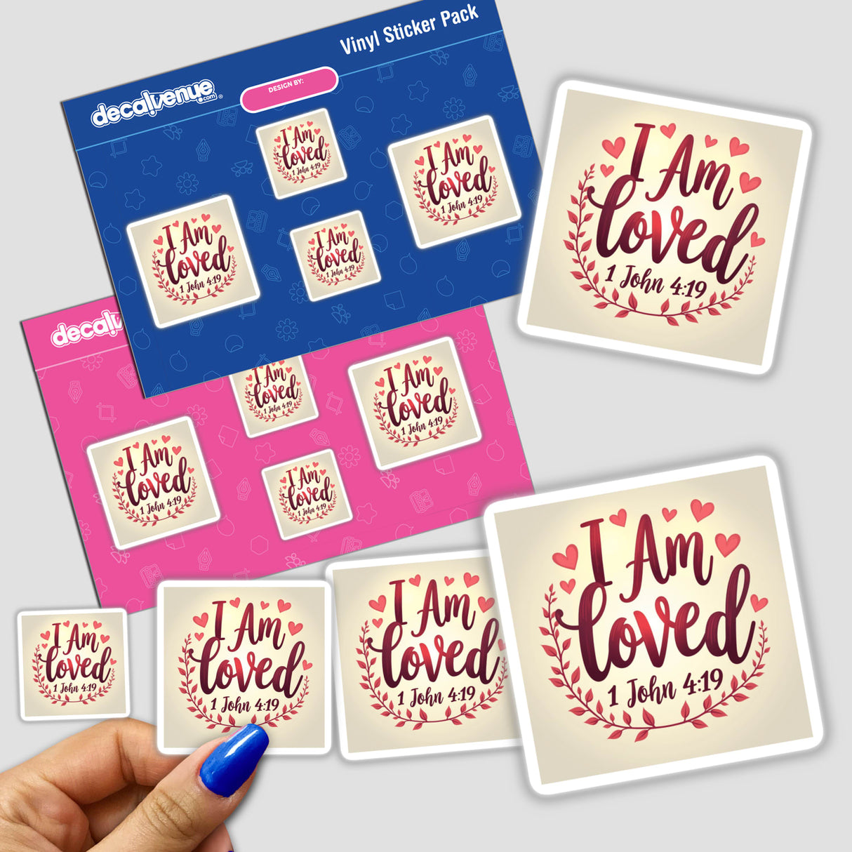 Hand holding 'I Am Loved - 1 John 4:19' Christian faith-based sticker from Decal Venue, showcasing heartfelt design. Available as stickers or digital artwork with commercial rights.