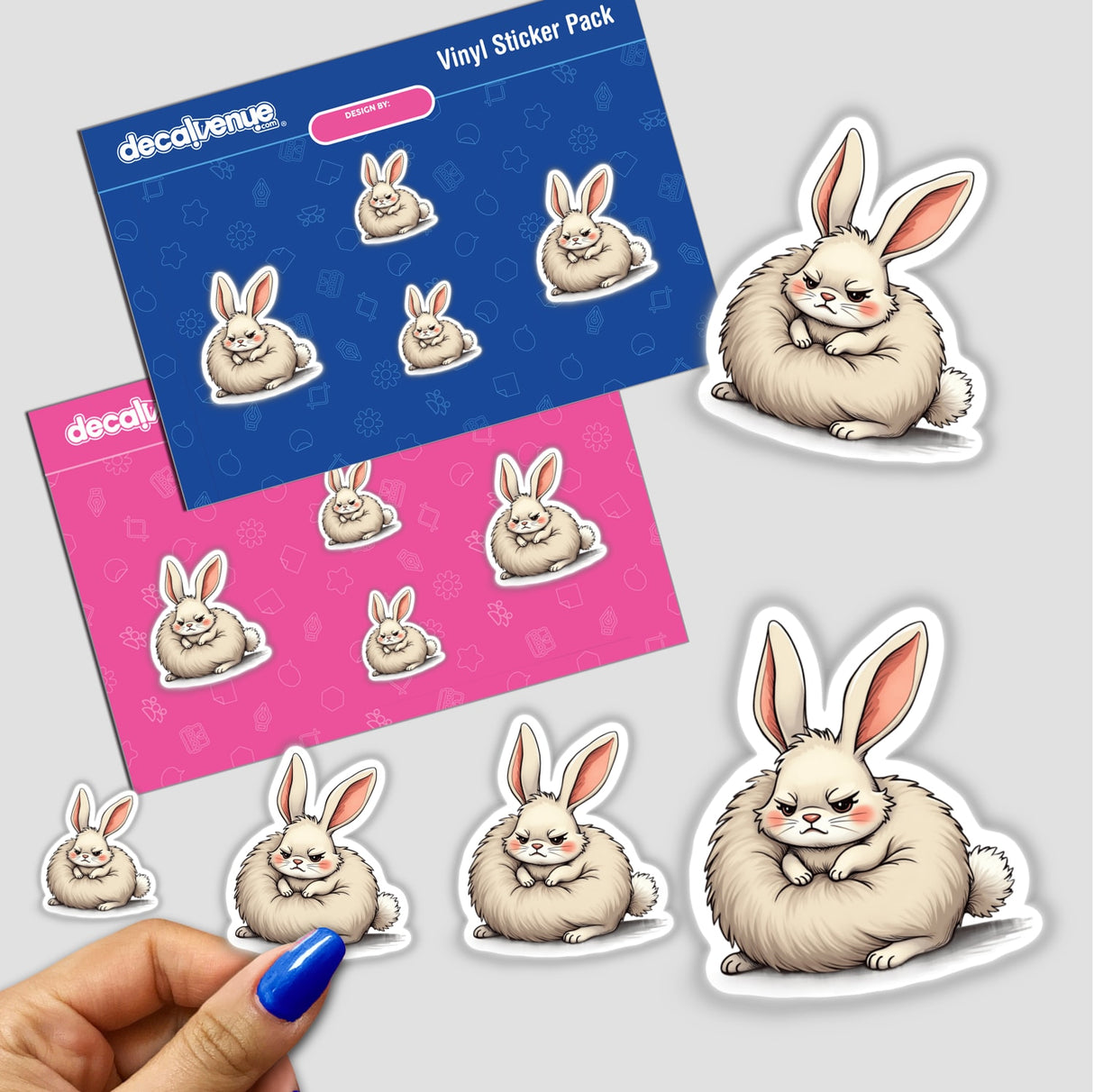 Grumpy Fluffy Bunny with Rosy Cheeks stickers, featuring a hand holding one of the cartoon rabbit stickers from the pack.