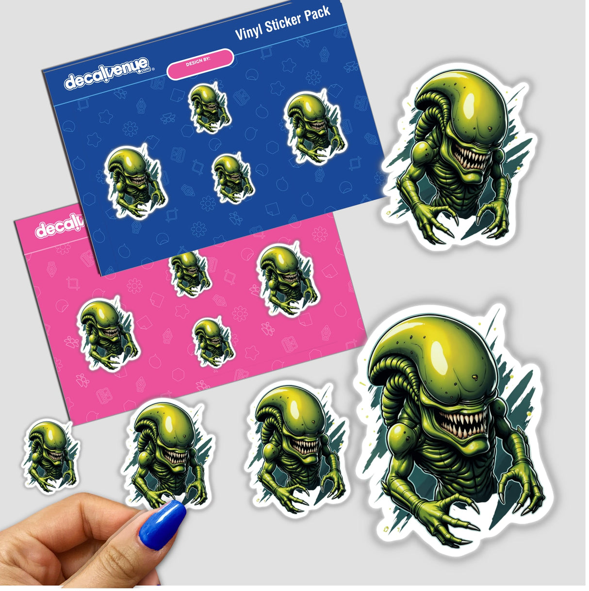 Sticker pack featuring 'A Cool Xenomorph Alien Warrior' with sharp claws and teeth, showcasing unique green alien creatures. Available as stickers or digital artwork from Decal Venue.