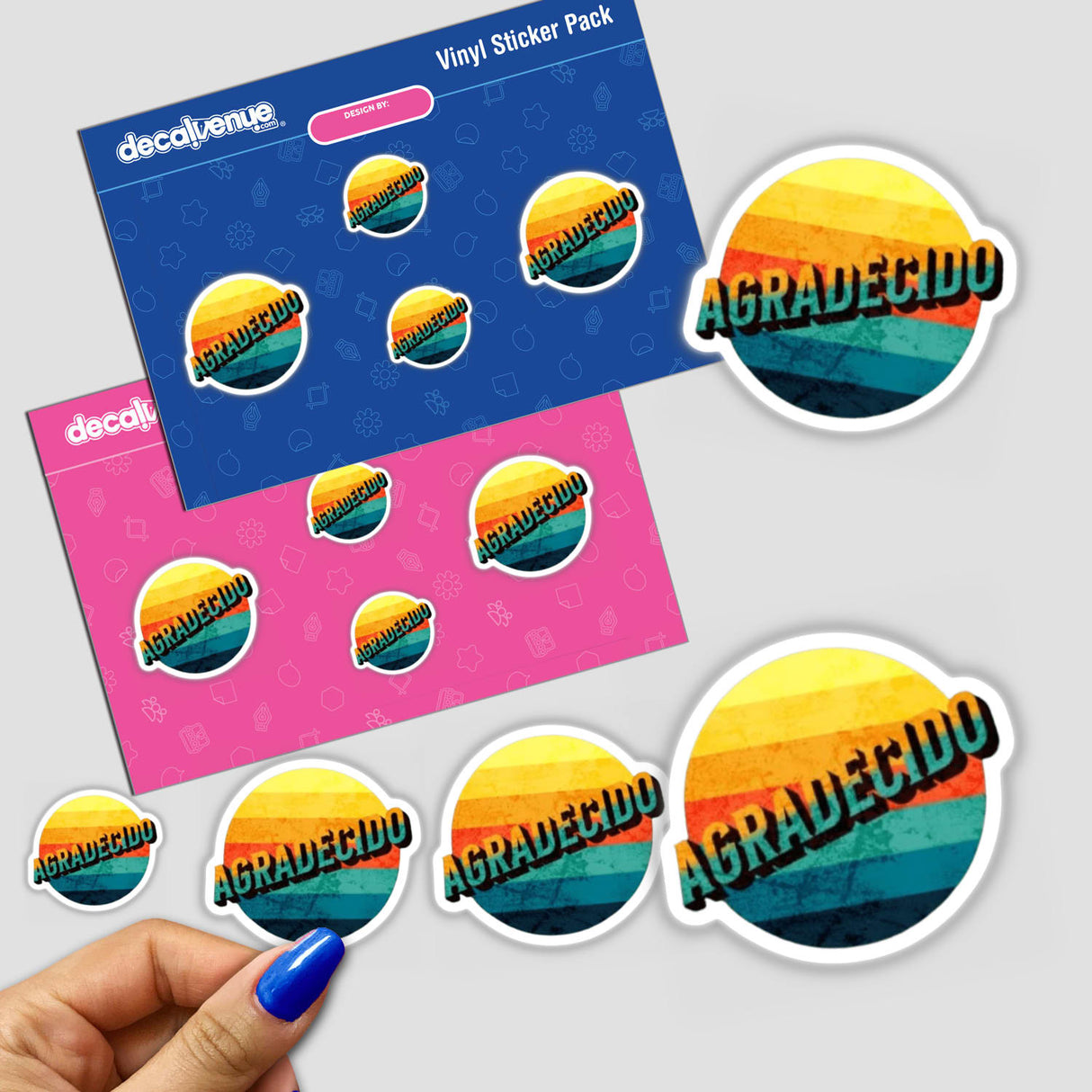 Agradecido Retro Clipart - Stickers or Download with Commercial Rights, featuring a close-up of a hand holding colorful circle stickers with text.