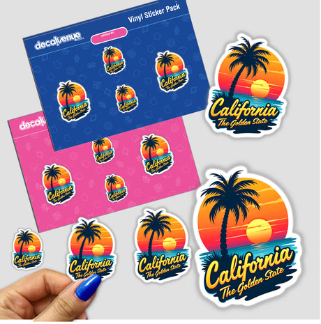 Hand holding a sticker titled California The Golden State, featuring a logo with palm trees and a sunset. Surrounded by various stickers, emphasizing the unique style of Decal Venue.