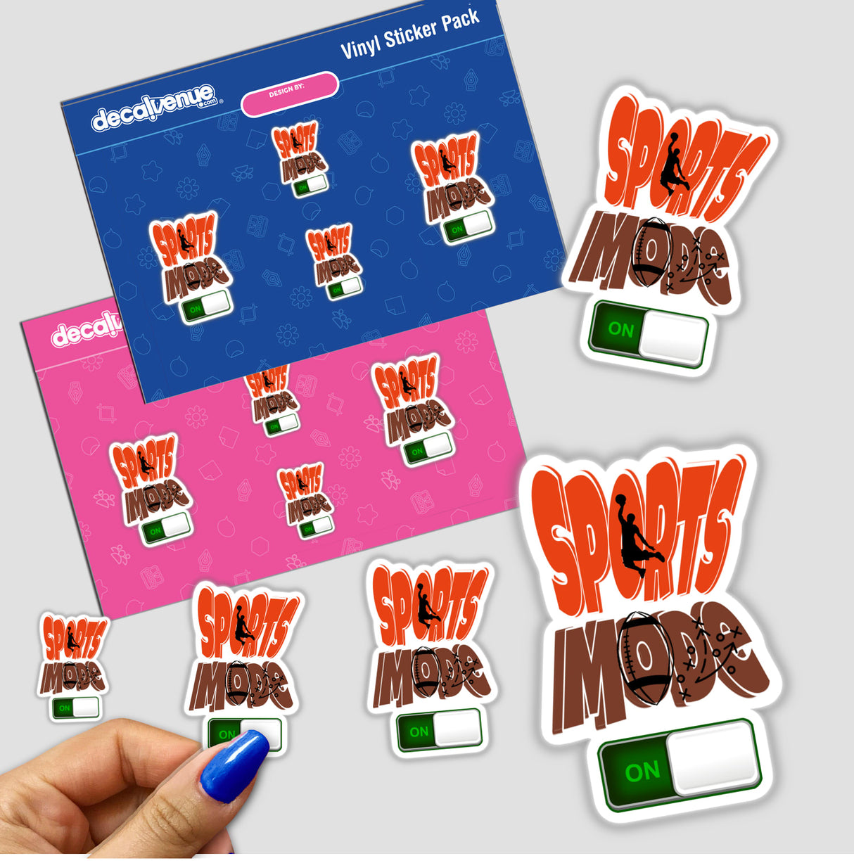 Hand holding Sports Mode stickers featuring various text and symbols, including a sports-themed logo, perfectly reflecting Decal Venue's unique sticker and digital art offerings.