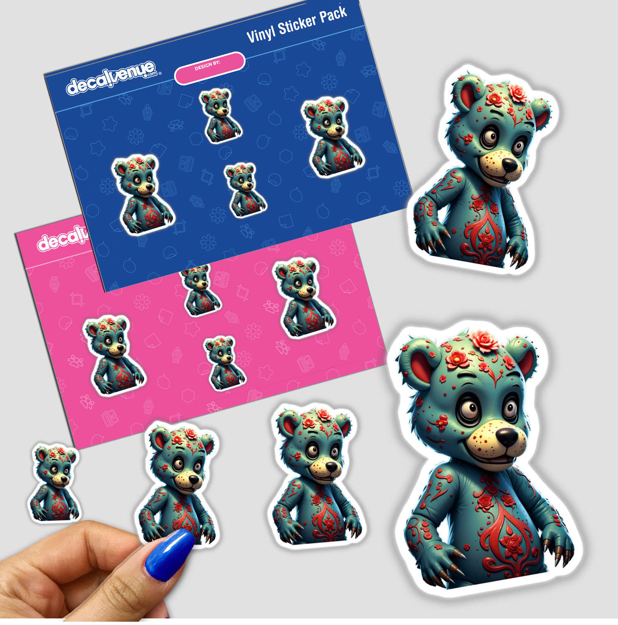 Sticker pack featuring 'A Macabre Scary Bear' with cartoon characters, including a bear in a blue and red garment, held by a hand.