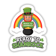 Cartoon leprechaun holding a sign with Ready To Shamrock St. Patrick's Day text, available as stickers or digital artwork, featuring a playful illustration of a pot of gold.