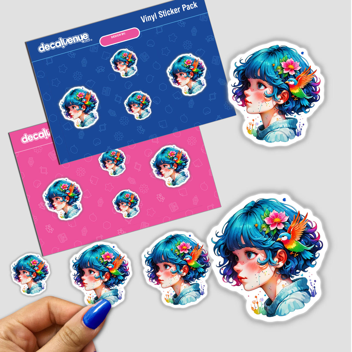 Hand holding a Vibrant Blue-Haired Anime Girl Sticker - Kawaii Portrait Illustration sticker pack, featuring multiple cartoon girls with birds and flowers in their hair, available as stickers or digital artwork.