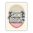 Retro Beach Sunset ‘Shine Bright’ Design featuring palm trees and a sun, available as unique vinyl stickers or digital artwork. Ideal for adding a vibrant, tropical touch to your space.